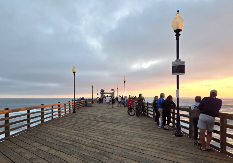 A recent sunset at the Oceanside Pier in Oceanside, Calif., draws everyone to one side.